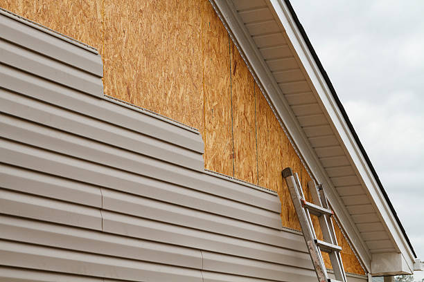 Professional Vinyl Siding technician working in Naples, FL